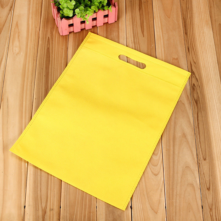 Pack of 100 Yellow Coloured 30x25cm Non-Woven Patch Handle Bags