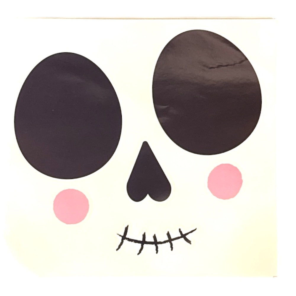 White Skull Shaped Pinata With Face Stickers